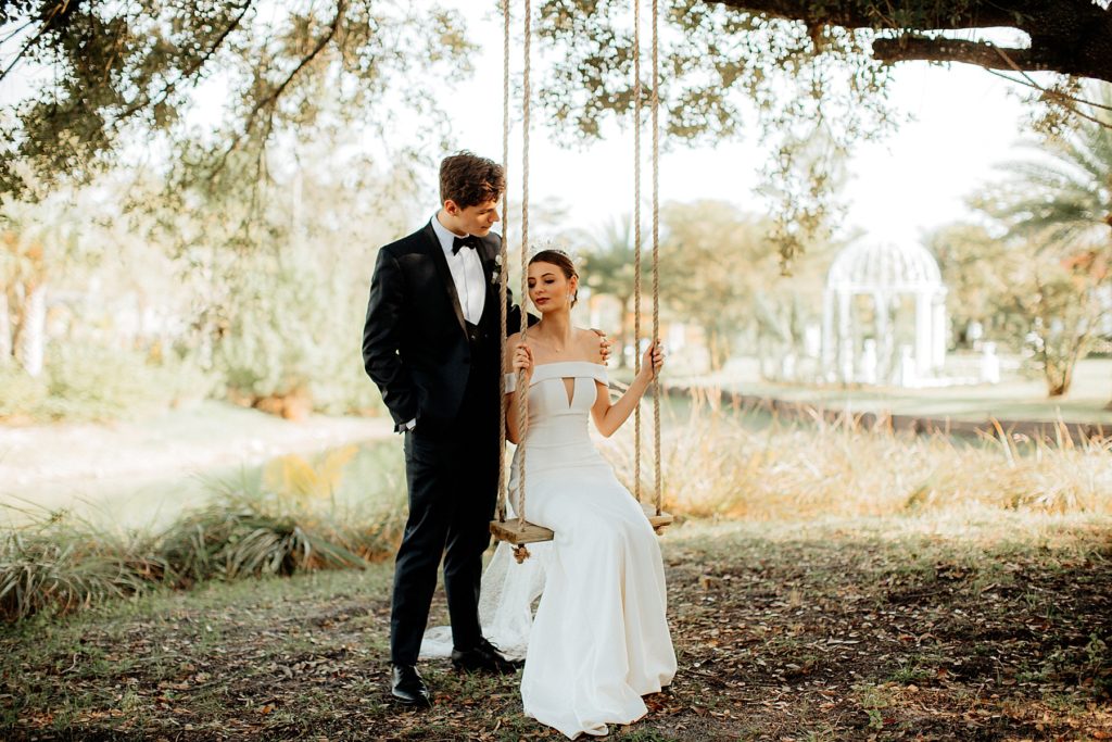Bride and Groom on Swing at Tuscan Inspired La Casa Toscana, Fort Meyers Florida Wedding Venue
